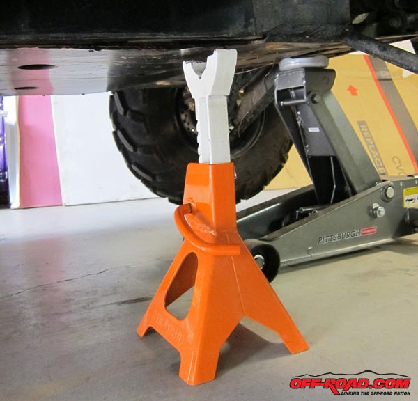 The first thing you should do when working on any SXS or heavy off-road vehicle is slip a couple of jack stands under the frame work  dont every rely on the hydraulic jack itself!