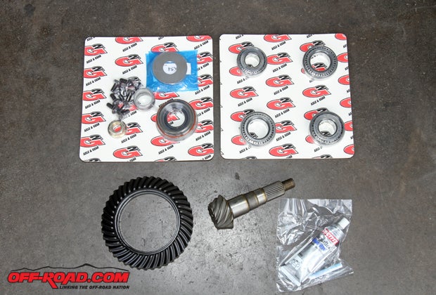 This phase of our project involved swapping out the 3.55 stock gearing for lower 4.56 gears from G2. Along with the ring and pinion we had all the necessary installation kits needed for the Dana 30 front and Dana 35 rear axles. 