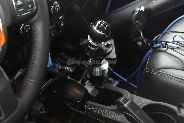 The gear shifter points to a new six-speed transmission compared to the current version used in the 2016 Wrangler.