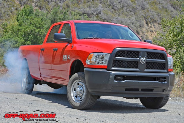 Even though its a four-door long-bed Ram, the 6.7-liter Cummins still can spin the tires with relative ease  its truly a torque monster!