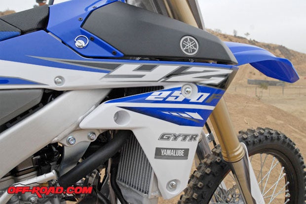 Just like last year, the 2015 YZ250Fs graphics are embedded into the radiator shrouds for increased durability.